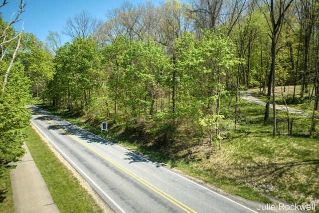 6050 Grand River Drive Ne, Ada Twp, MI 49301