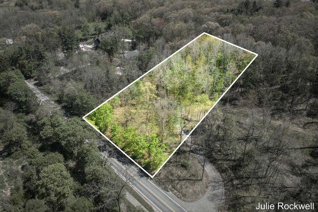 6050 Grand River Drive Ne, Ada Twp, MI 49301