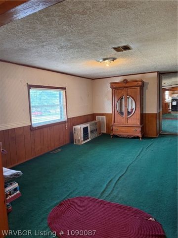 211 E Woodson Avenue, Bonanza, AR 72916