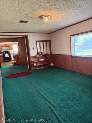 211 E Woodson Avenue, Bonanza, AR 72916