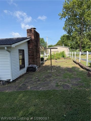 211 E Woodson Avenue, Bonanza, AR 72916