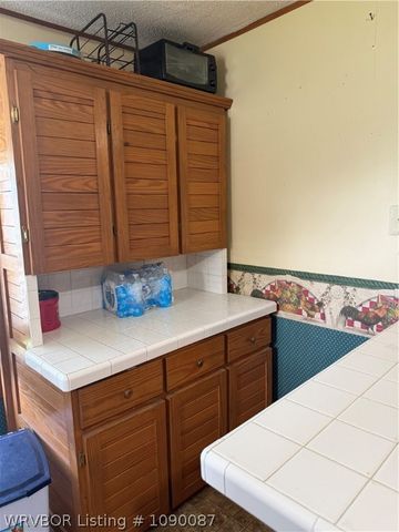 211 E Woodson Avenue, Bonanza, AR 72916