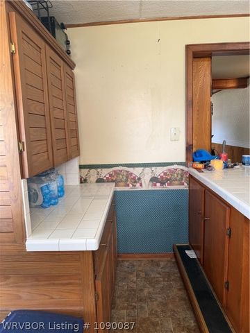 211 E Woodson Avenue, Bonanza, AR 72916