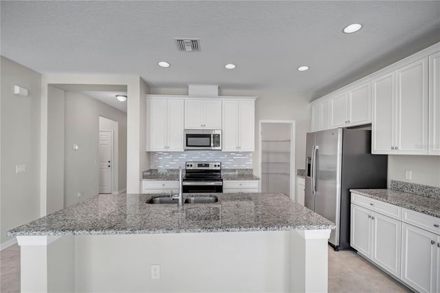 7384 POOL COMPASS LOOP, Wesley Chapel, FL 33545