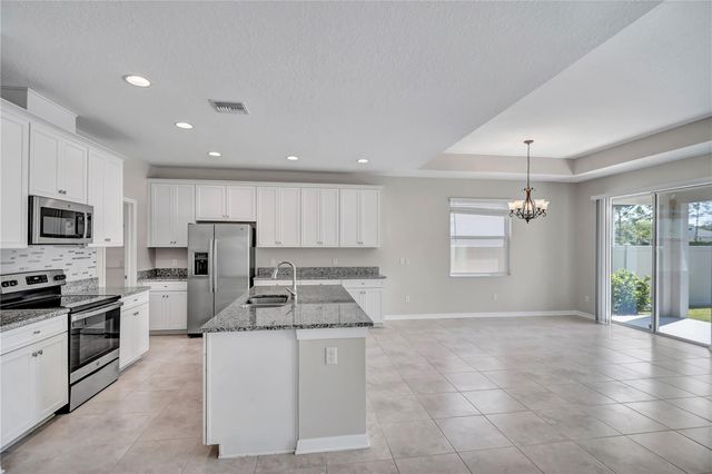 7384 POOL COMPASS LOOP, Wesley Chapel, FL 33545