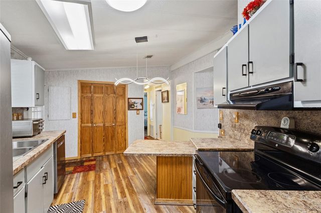 713 TANGERINE WOODS BOULEVARD, Englewood, FL 34223