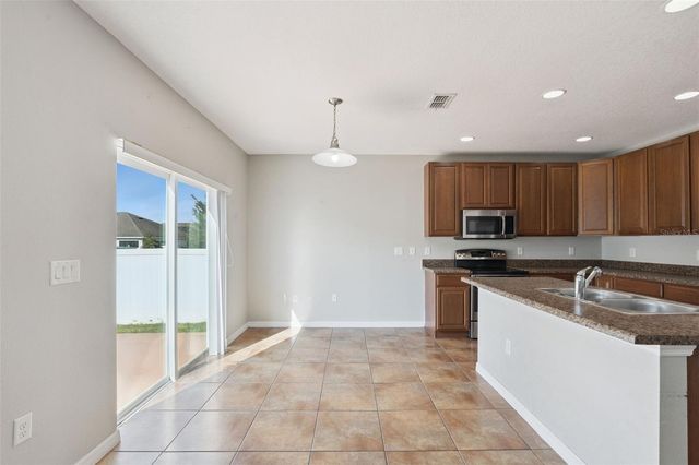 1038 SUFFRAGETTE CIRCLE, Haines City, FL 33844