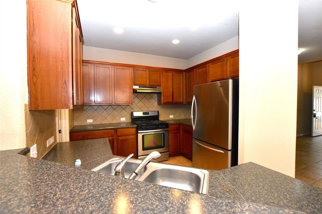 427 Tranquility MTN, Buda, TX 78610