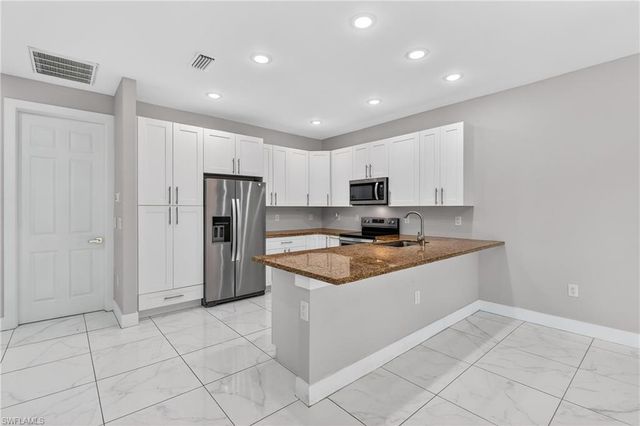 702 NORMAN AVE N, Lehigh Acres, FL 33971