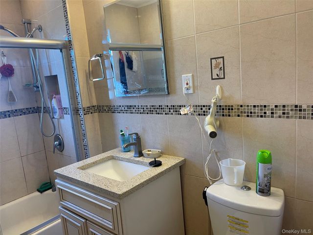 6166 78th Street, Middle Village, NY 11379