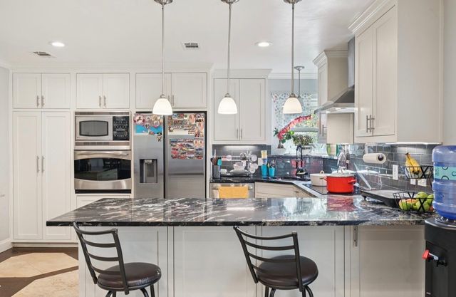 7813 Creek Wood Drive, Rowlett, TX 75089