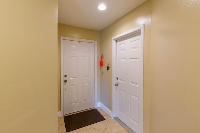 1599 Woodbridge Lakes Circle, West Palm Beach, FL 33406