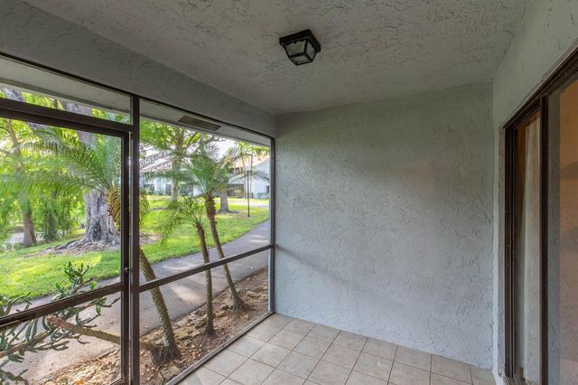 1599 Woodbridge Lakes Circle, West Palm Beach, FL 33406