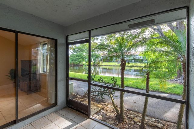1599 Woodbridge Lakes Circle, West Palm Beach, FL 33406