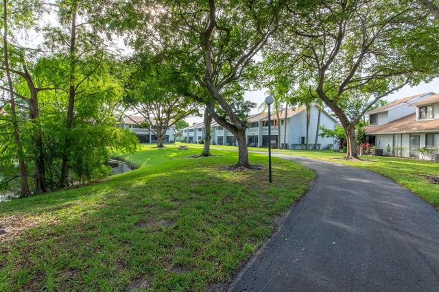1599 Woodbridge Lakes Circle, West Palm Beach, FL 33406