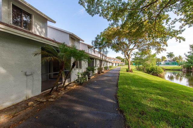 1599 Woodbridge Lakes Circle, West Palm Beach, FL 33406