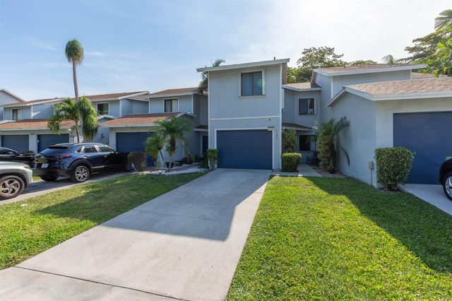1599 Woodbridge Lakes Circle, West Palm Beach, FL 33406