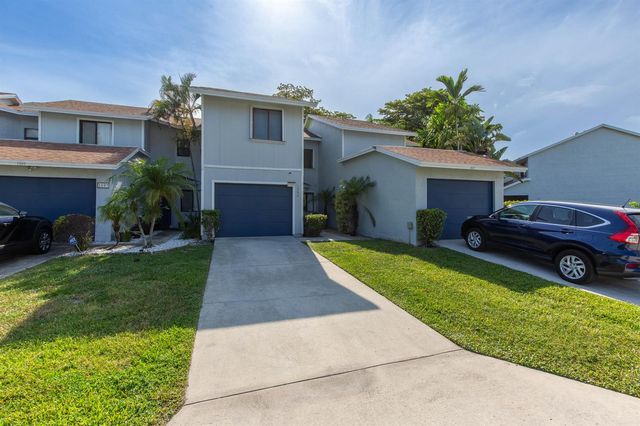 1599 Woodbridge Lakes Circle, West Palm Beach, FL 33406