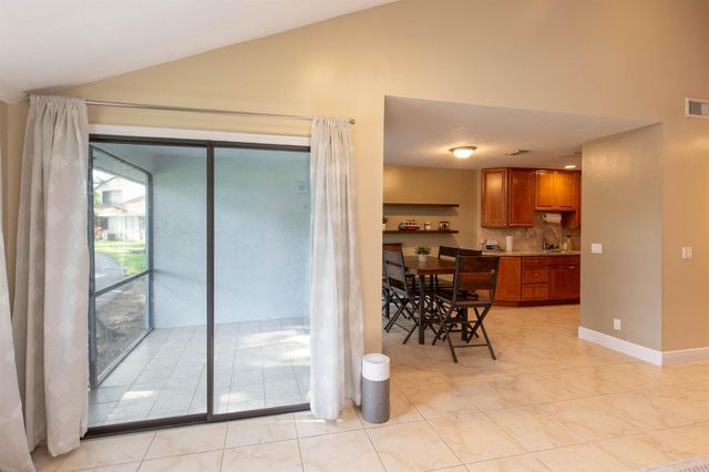1599 Woodbridge Lakes Circle, West Palm Beach, FL 33406
