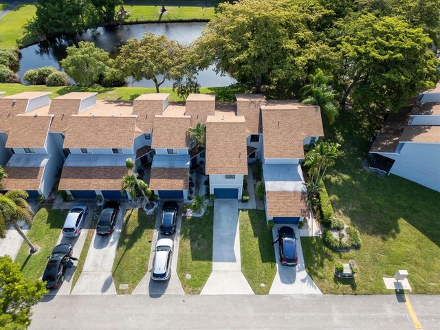 1599 Woodbridge Lakes Circle, West Palm Beach, FL 33406