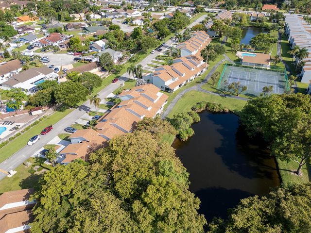 1599 Woodbridge Lakes Circle, West Palm Beach, FL 33406