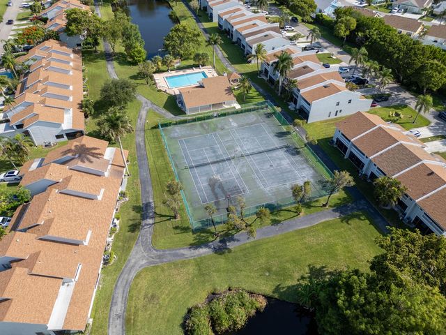 1599 Woodbridge Lakes Circle, West Palm Beach, FL 33406