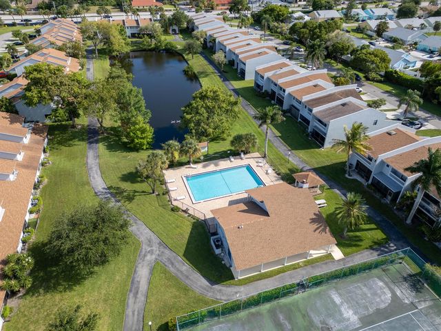 1599 Woodbridge Lakes Circle, West Palm Beach, FL 33406