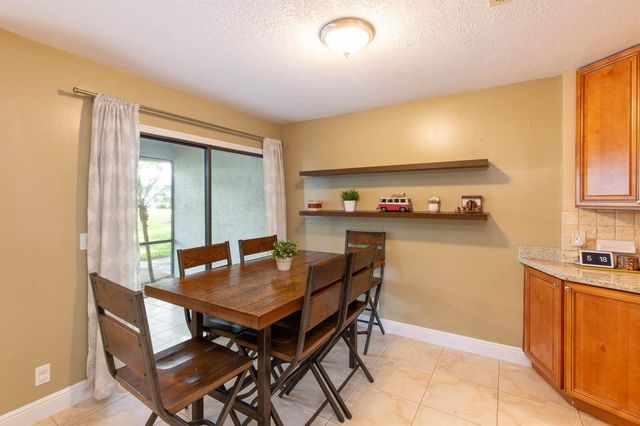 1599 Woodbridge Lakes Circle, West Palm Beach, FL 33406