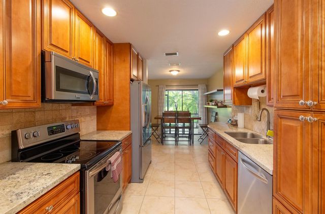 1599 Woodbridge Lakes Circle, West Palm Beach, FL 33406