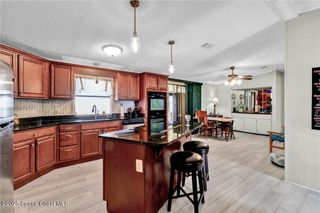 729 Gladiolus Drive, Barefoot Bay, FL 32976