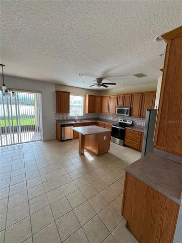 9761 LAKE DISTRICT LANE, Orlando, FL 32832