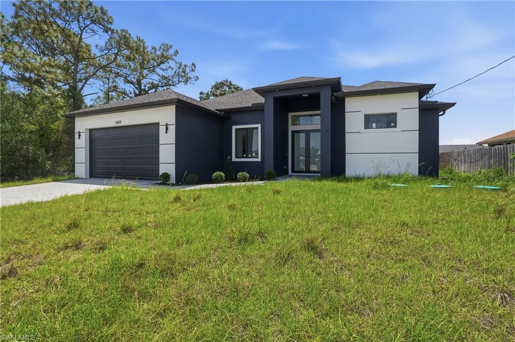 3418 8th ST SW, LEHIGH ACRES, FL 33976 — photo 2