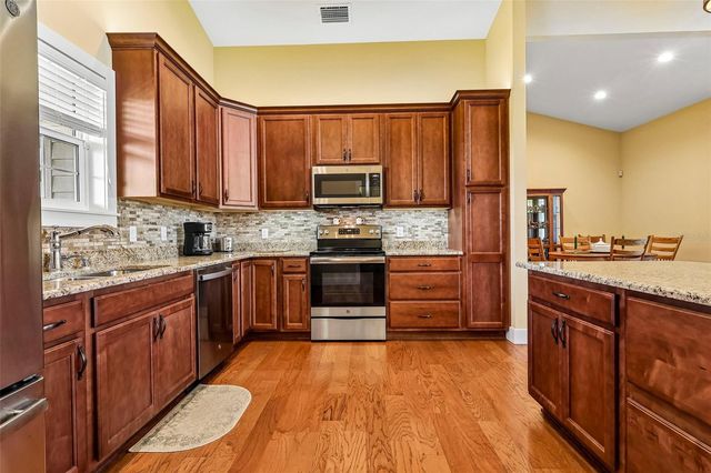 3670 LAKE HATCHINEHA ROAD, Haines City, FL 33844