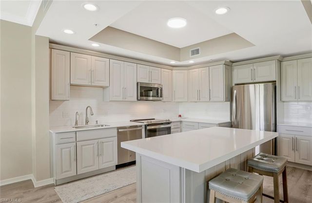 3485 LAUREL GREENS LN S 102, Naples, FL 34119