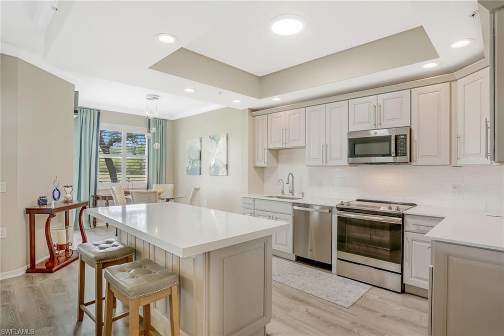 3485 LAUREL GREENS LN S 102, NAPLES, FL 34119 — photo 4