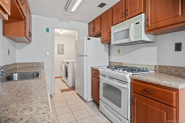 221 Sagamore Hills Drive 221, Port Jefferson Station, NY 11776