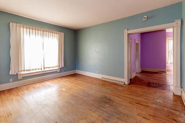 211 E WOLF RIVER AVENUE, New London, WI 54961