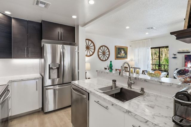 120 HIBISCUS WOODS COURT 3B, Deltona, FL 32725