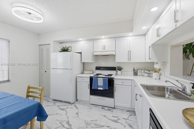 1200 SW 137th Avenue 308E, Pembroke Pines, FL 33027
