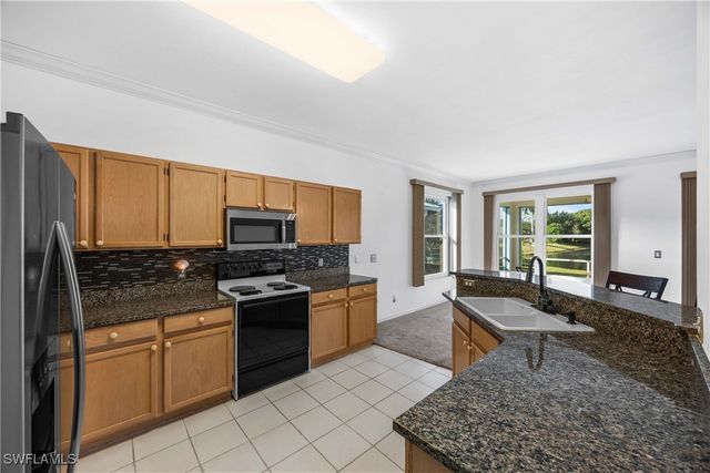 223 Stanhope CIR, Naples, FL 34104