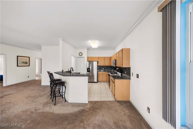 223 Stanhope CIR, Naples, FL 34104