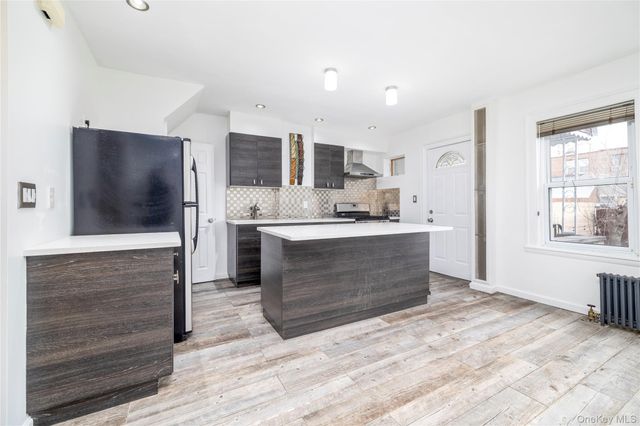 6779 Exeter Street, Forest Hills, NY 11375