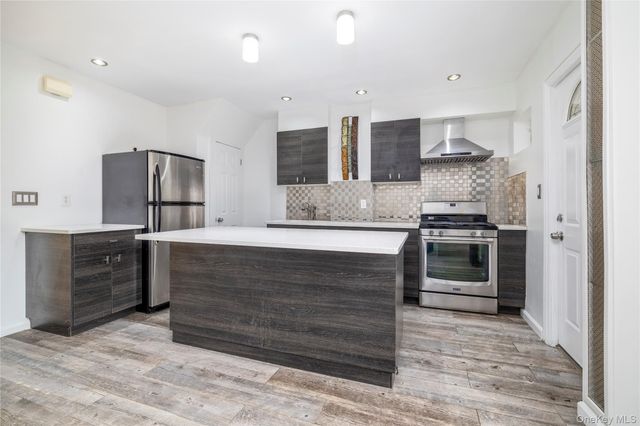 6779 Exeter Street, Forest Hills, NY 11375