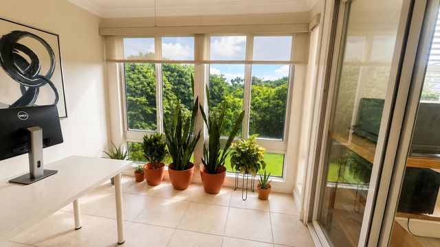 21 COLONIAL CLUB Drive 303, Boynton Beach, FL 33435