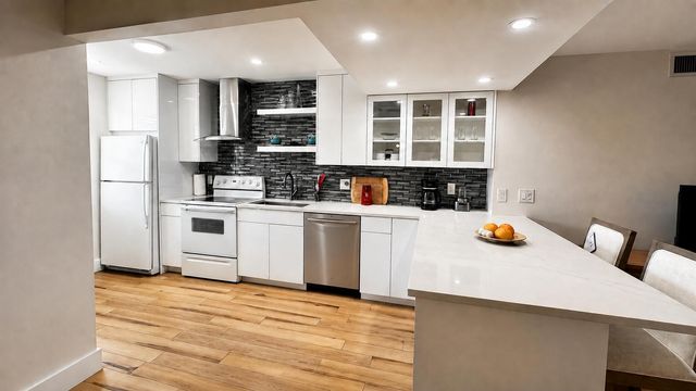 21 COLONIAL CLUB Drive 303, Boynton Beach, FL 33435
