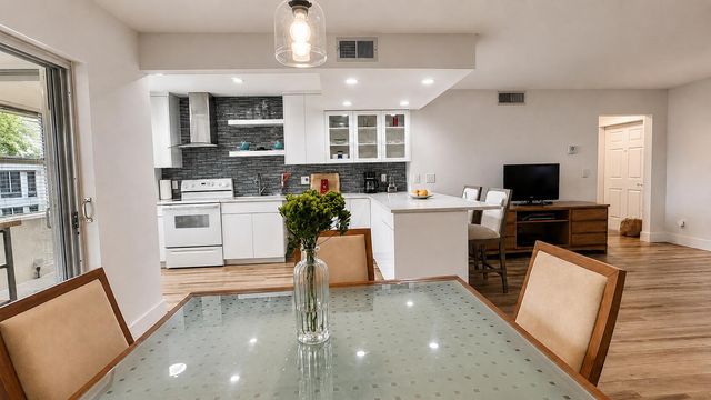 21 COLONIAL CLUB Drive 303, Boynton Beach, FL 33435