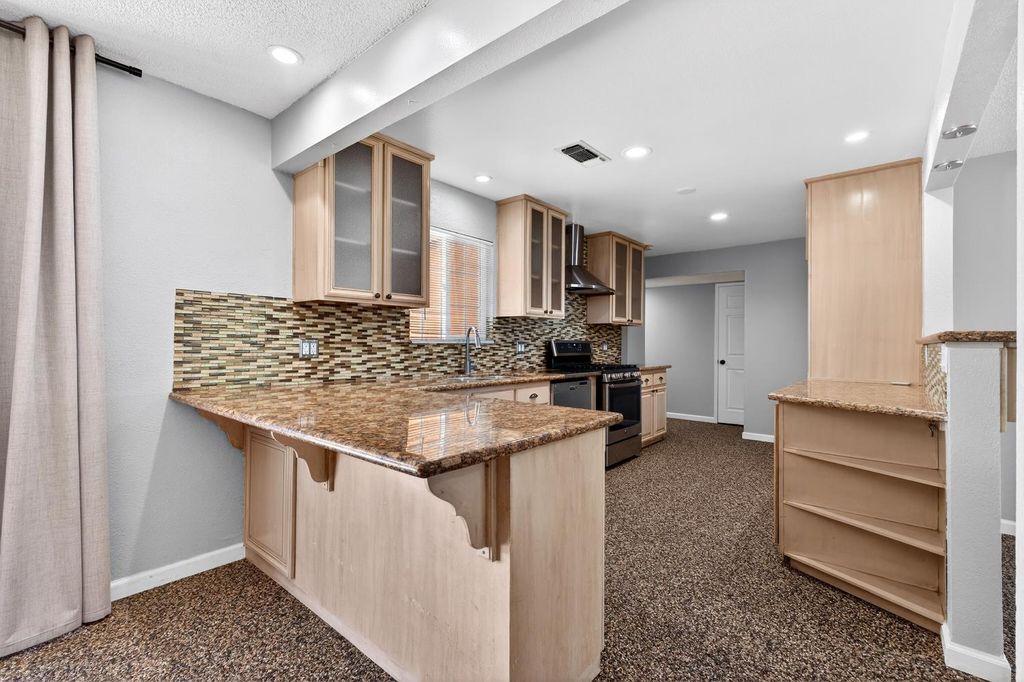 Image 12 of property listing at 613 E Spruce Avenue, Lemoore, CA 93245