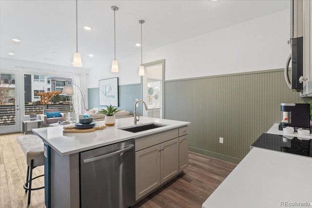 6153 N Ceylon Street 9-102, Denver, CO 80249