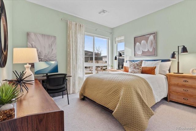 6153 N Ceylon Street 9-102, Denver, CO 80249