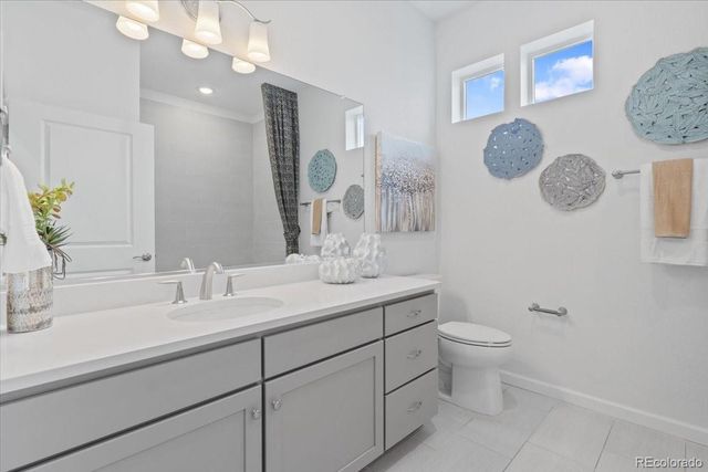 6153 N Ceylon Street 9-102, Denver, CO 80249